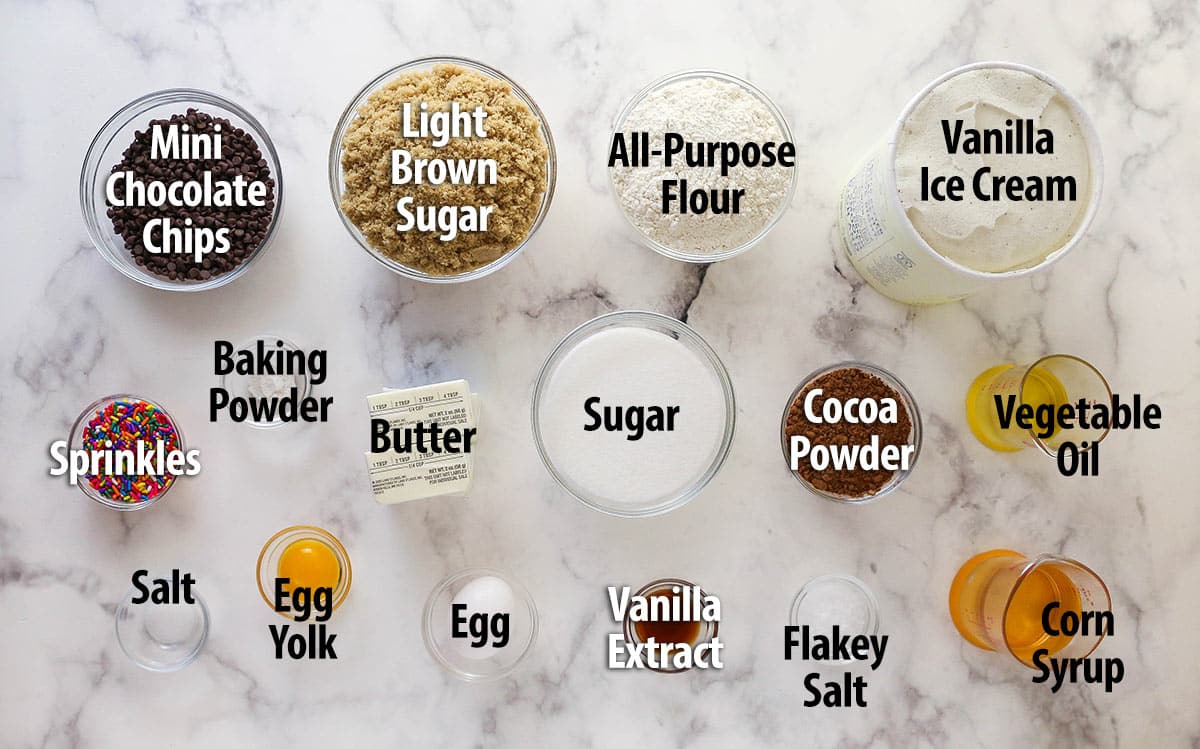 Brownie cookie dough ice cream sandwiches combine three favorites in one, with a few key ingredients to ensure they stay soft. Overhead view of ingredients needed to make brownie cookie dough ice cream sandwiches